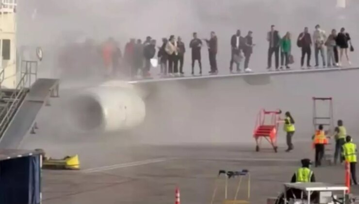 Acil iniş yapan yolcu uçağında yangın: 12 kişi yaralandı