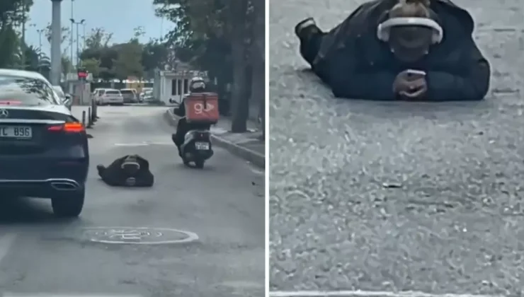 Dünya umurunda değil! Yolun ortasına uzanıp yaptığına bakın