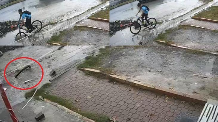 Hatay'da kan donduran görüntü! Bisikletiyle yağmur suyu dolu çukura düştü