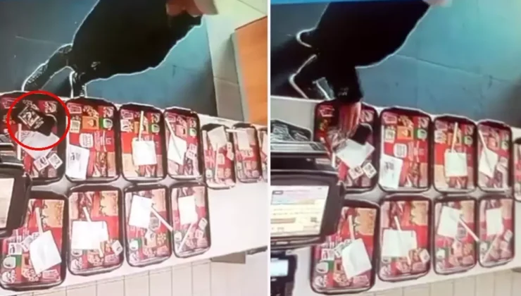 Restoranda yemek tepsisindeki cep telefonunu çaldı