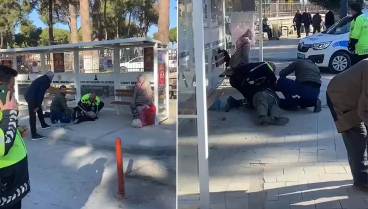 Otobüs durağında yere yığılan yaşlı adamı hayata polis döndürdü