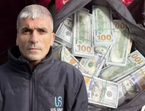 Temizlik yaparken ağacın dibinde içi dolar dolu paket buldu