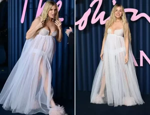 Ünlü oyuncu hamileliğini tül elbisesiyle kırmızı halıda duyurdu