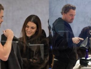 Leonardo Dicaprio’yu sevgilisi giydiriyor